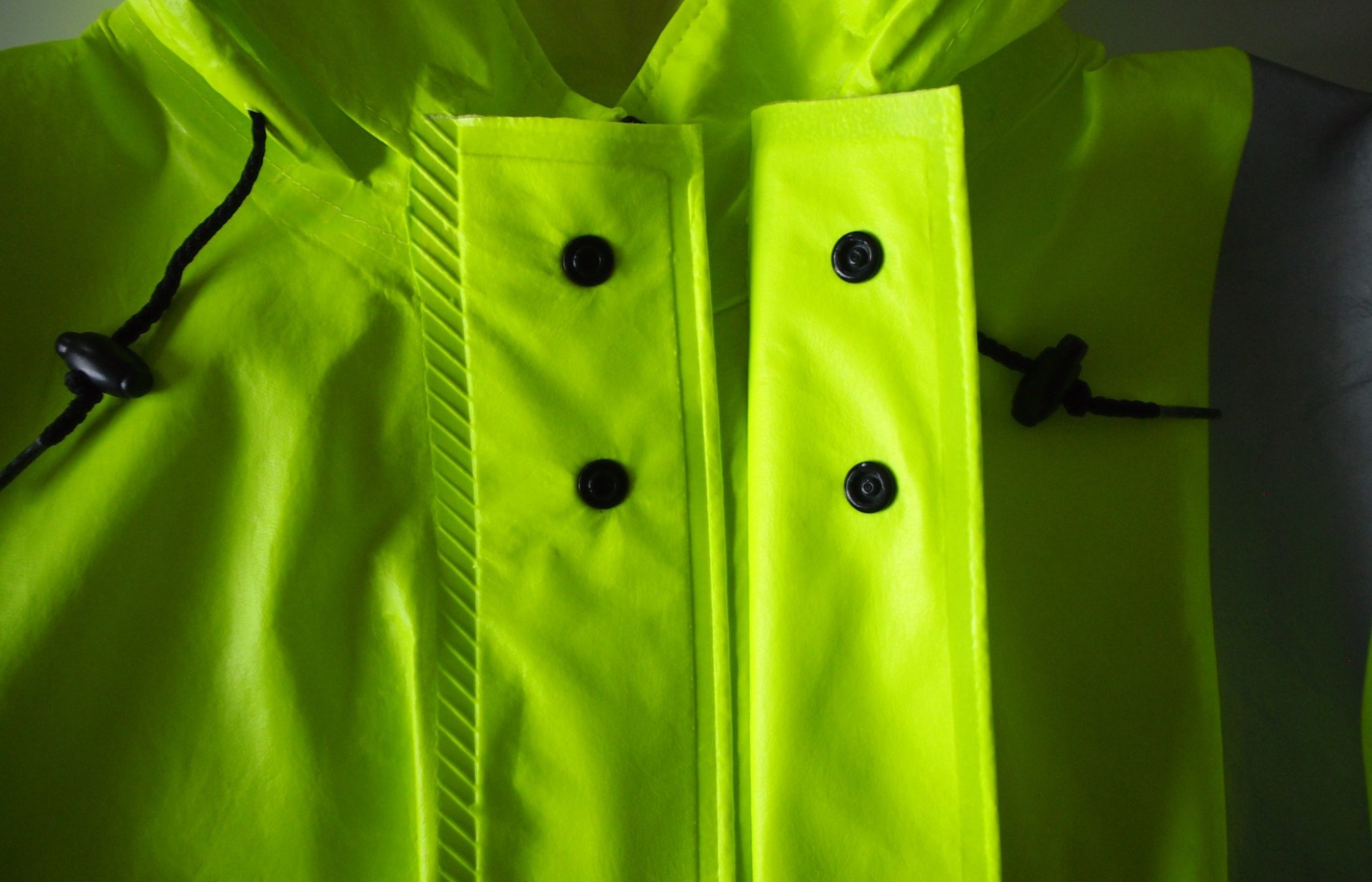 Safety: Dual Over Fly Front Closure